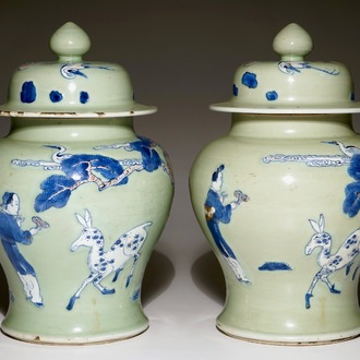 Een paar Chinese celadon, koperrood en onderglazuur blauw dekselvazen, Kangxi