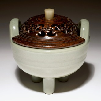 A Chinese tripod celadon censer with jade-inset wooden cover, 19th C.