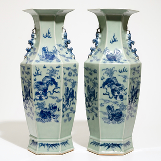 A pair of Chinese hexagonal blue and white on celadon ground vases with buddhist lions, 19th C.