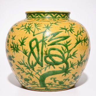 A Chinese yellow ground jar with green "Three friends of winter" design, marked Wanli, 19/20th C.