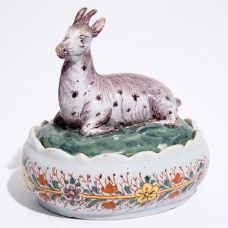 A polychrome Dutch Delft butter tub with a goat, 18th C.