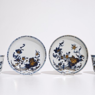 A pair of Chinese blue, white and gilt cups and saucers, Qianlong