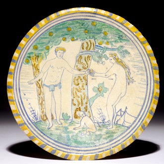 A polychrome Dutch maiolica plate with Adam and Eve, ca. 1600