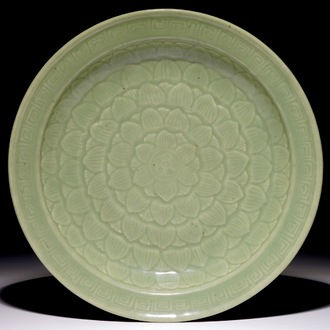 A Chinese celadon dish with incised lotus design, 19th C.