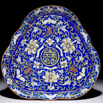 A Chinese polychrome triangular dish with “Shou” characters, 19th C.