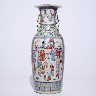 A tall Chinese famille rose vase with a garden scene, 19th C.