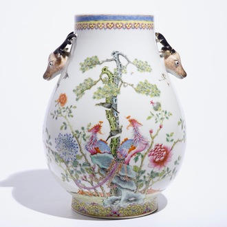 A Chinese famille rose hu vase with phoenixes and deer head handles, Qianlong mark, 19/20th C.