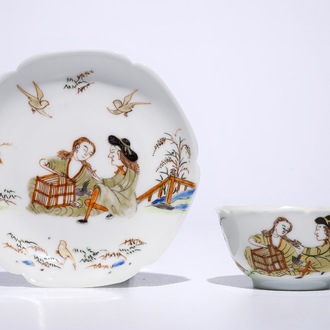 A fine Chinese export porcelain eggshell cup and saucer with a couple with a birdcage, Yongzheng