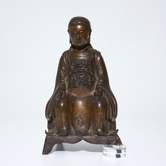 A Chinese bronze model of a seated Zhenwu, Ming