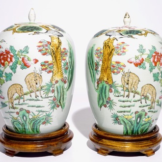 A pair of Chinese famille rose covered jars with cranes and deers, 19/20th C.