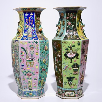 Two Chinese famille rose hexagonal relief-decorated vases, 19th C.