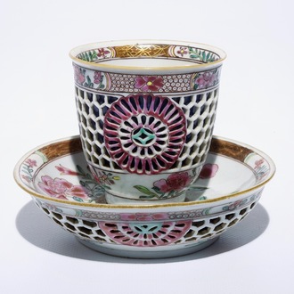 A Chinese double-walled famille rose cup and saucer, Yongzheng/Qianlong