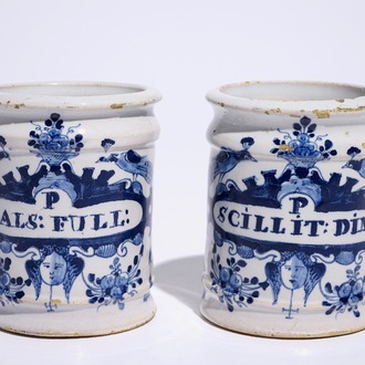 A pair of small Dutch Delft blue and white albarello-shaped pharmacy drug jars, 18th C.