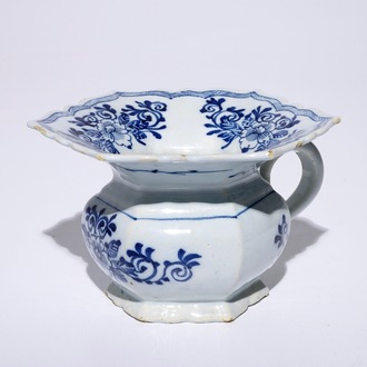 A Dutch Delft blue and white spittoon, 18th C.