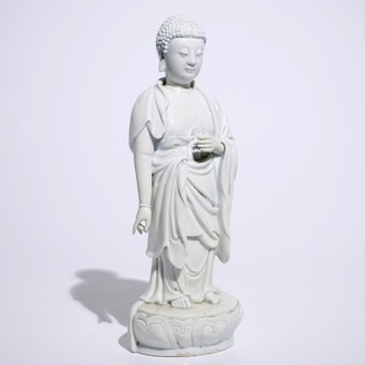 A Chinese Dehua blanc de Chine model of a standing Buddha, impressed mark on the back, Kangxi