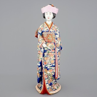 A large Japanese Kutani figure of a bijin, Meiji, 19th C.
