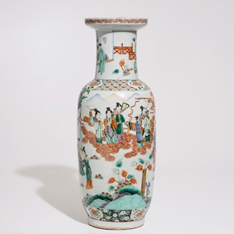 A Chinese famille verte rouleau vase with a court scene, 19th C.