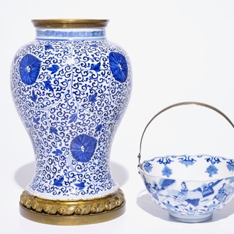 A blue and white Chinese silver-handled bowl, Kangxi mark and of the period, and a bronze-mounted vase, Kangxi