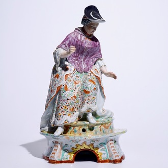 A massive Dutch Delft polychrome petit feu fountain in the shape of a lady, 18th C.