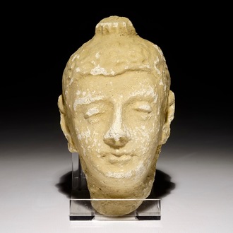 A small stucco head of Buddha, prob. Gandhara, India, 10/11th C.