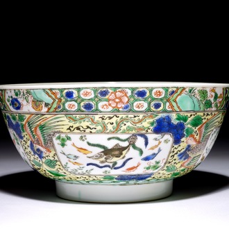 A Chinese famille verte bowl with fish and phoenixes, Kangxi