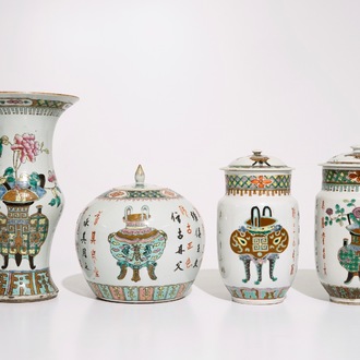 A set of matching Chinese famille verte vases and covers, 19th C