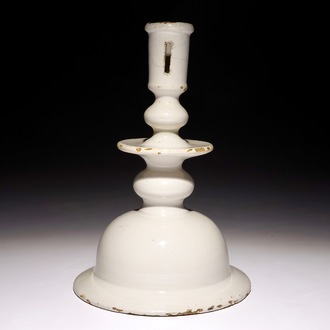 A rare large white Dutch Delft candlestick, 17th C.