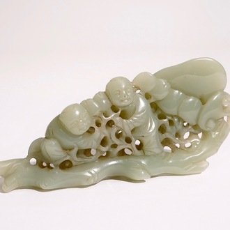 A Chinese pale celadon jade group of boys on a lingzhi, 19th C.