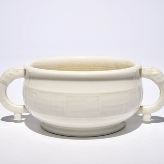 A round Chinese Dehua blanc de Chine censer with moulded and underglaze decoration, 19th C.