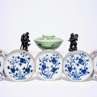 A varied lot of five Chinese plates, a pair of serpentine stone figures and a Japanese bowl and cover, 18/20th C.