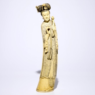 A tall Chinese carved ivory figure of Guanyin, 19th C.