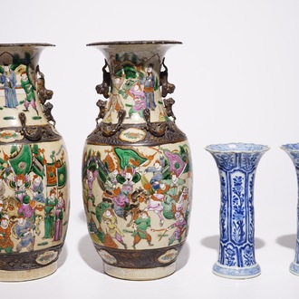 A pair of Chinese blue and white Kangxi vases and a pair of famille rose Nanking vases, 19th C.