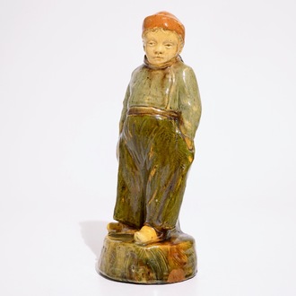 A Flemish pottery figure, "The little farmer", prob. Laigneil workshop, 20th C.
