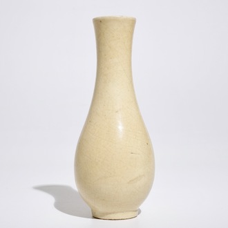 A Chinese monochrome cream-glazed vase, 19th C.