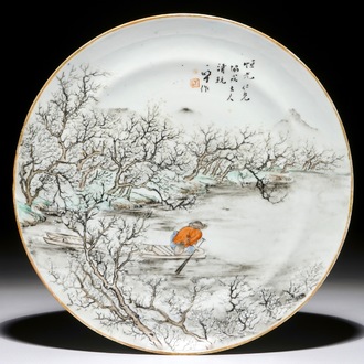 A Chinese qianjiang cai plate with a fisherman, 19/20th C.