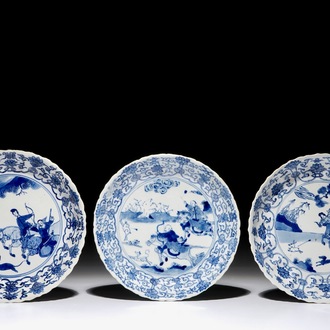 Three Chinese blue and white fluted plates with a Mongolian hunting scene, Chenghua marks, Kangxi