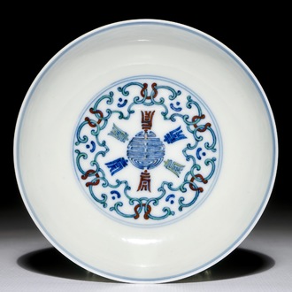A Chinese doucai saucer plate with Shou-characters, Yongzheng mark, 19/20th C.