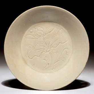 A small Chinese Dingyao plate with anhua lotus design, Northern Song