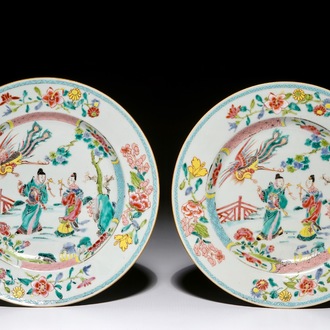 A pair of Chinese famille rose plates with a phoenix above figures, Qianlong