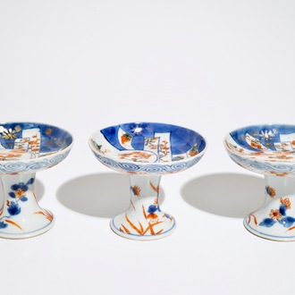 Three Chinese Imari style stem cups, Kangxi/Qianlong