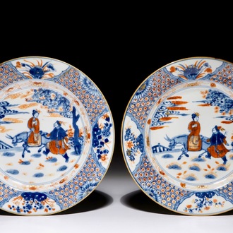 A pair of Chinese Imari style plates with a lady on a donkey, Kangxi