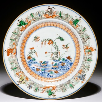A Chinese famille verte doucai plate with immortals and mandarin ducks, Kangxi/Yongzheng