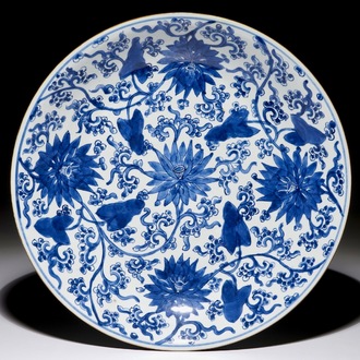 A Chinese blue and white lotus scroll dish, Kangxi