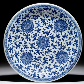 A large Chinese blue and white lotus scroll dish, Qianlong mark and of the period