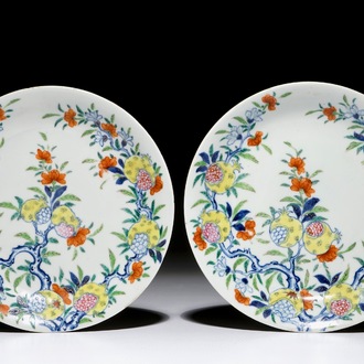 A pair of Chinese doucai pomegranate plates, Qianlong mark and of the period