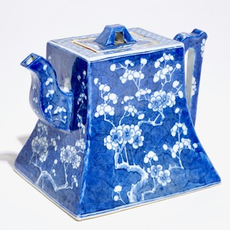 A Chinese blue and white "prunus and ice" teapot and cover, Kangxi mark, 19th C.