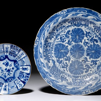 A Chinese blue and white lotus charger and a kraak-style plate, Kangxi