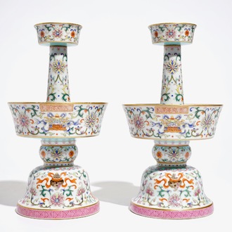 A pair of Chinese famille rose candlesticks, Jaiqing mark, 19/20th C.