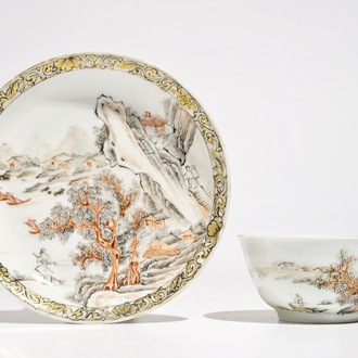 A Chinese grisaille and gilt cup and saucer with a fine landscape, Yongzheng