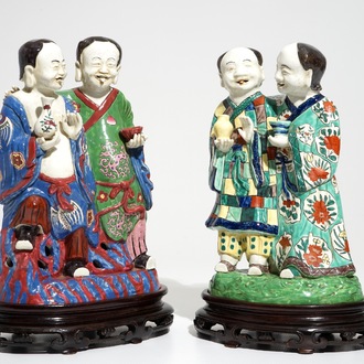 Two tall Chinese famille rose groups of the Hehe Er Xian brothers, 19/20th C.